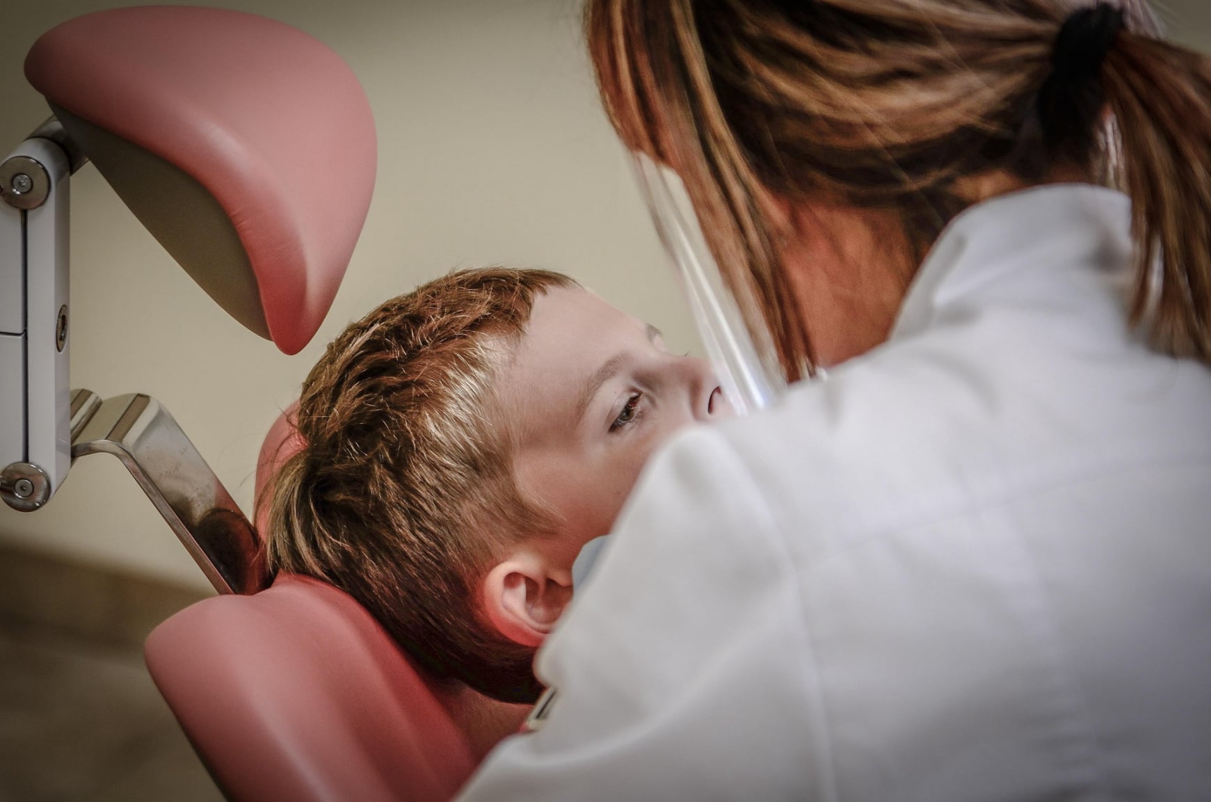 Kid in dental chair